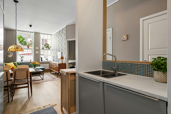 Kitchen and living room interior of a condo